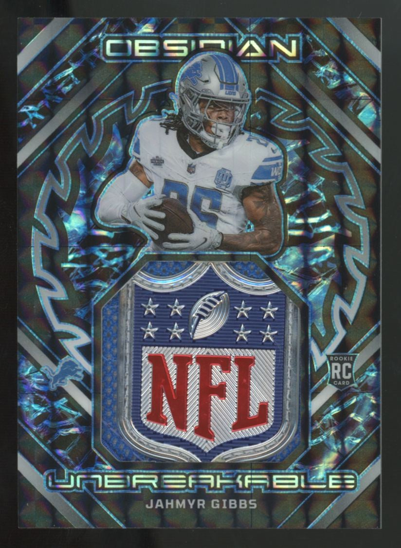 2023 Obsidian Jahmyr Gibbs RC Unbreakable Blue Electric Etch Shield Patch 1/1