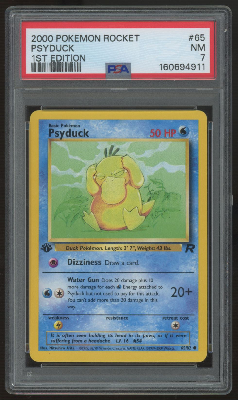 2000 Pokemon Psyduck Team Rocket 1st Edition #65 PSA 7