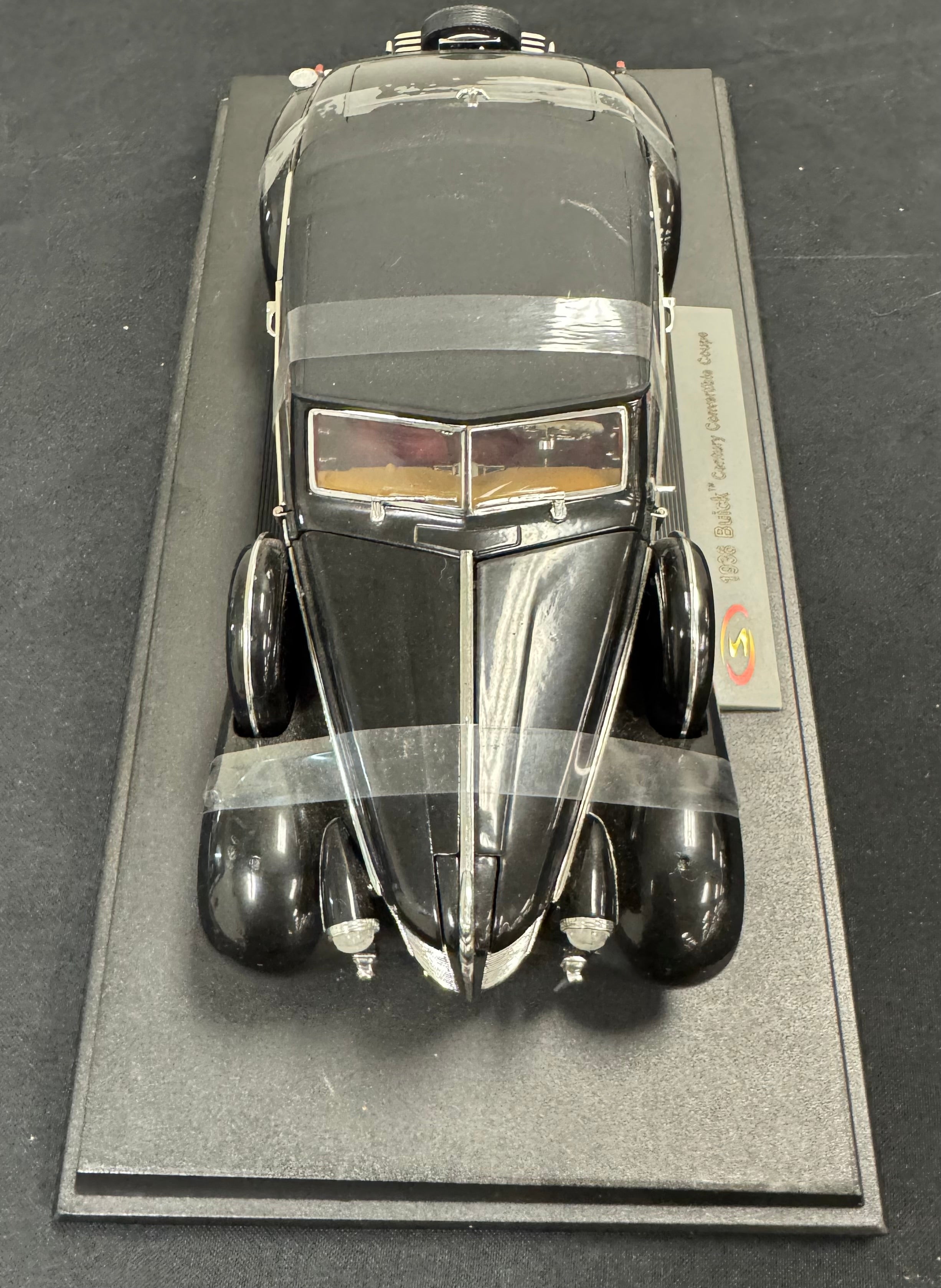 1938 Buick Century Convertible Coupe Black 1/18 Diecast Car with Stand