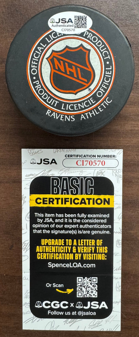 Harry Howell Signed Autographed Puck JSA Cert